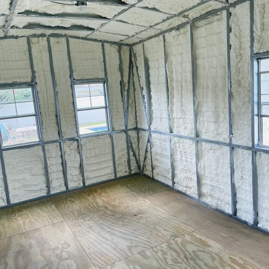 Closed-cell spray foam insulation applied to wall cavities in a residential project in Coral Terrace